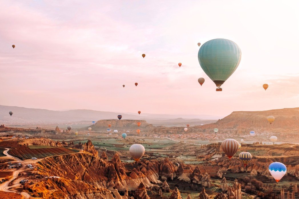 colorful hot air balloons flying over the valley at cappadocia sunrise time popular travel